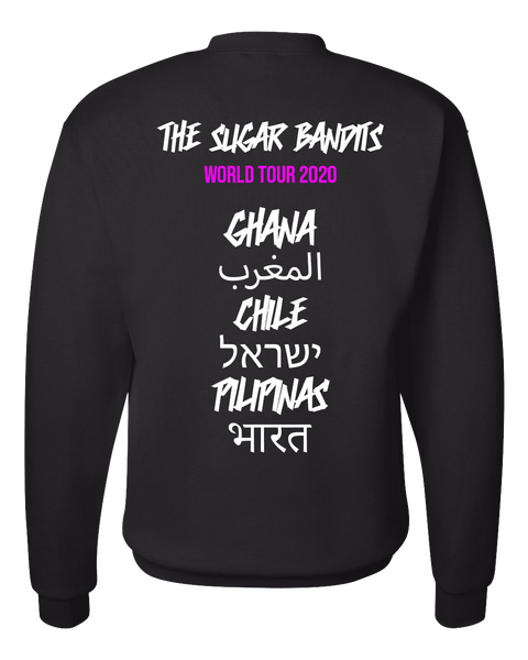 The back of a black crewneck sweater has The Sugar Bandits written in white across the top center, World Tour 2020 is written in hot pink underneath that. Then centered down the middle below that are all written in white are the tour stops: Ghana, Morocco written in Arabic, Chile, Israel written in Hebrew, the Philippines written in Tagalog, and India written in Hindi.