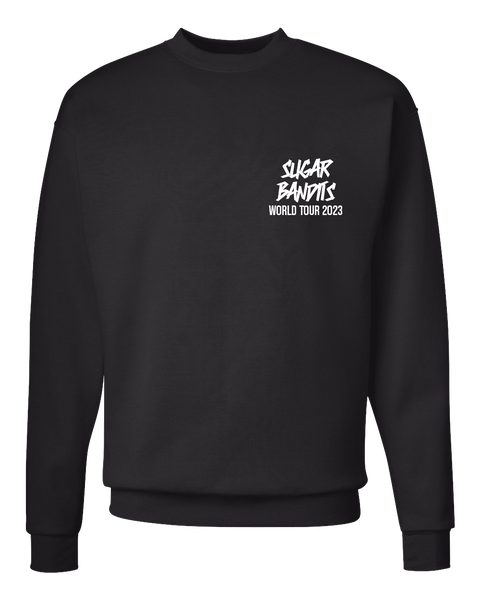 A black crewneck sweater with the The Sugar Bandits logo written in white where a pocket would be, World Tour 2023 is written in white underneath that.