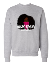 Load image into Gallery viewer, A heather gray crewneck sweater that has the The Sugar Bandits bandit in the center of it. She has a pink bandana covering the bottom half of her face. The The Sugar Bandits logo is written in white horizontally across the bandana and World Tour 2020 is written in white below that.
