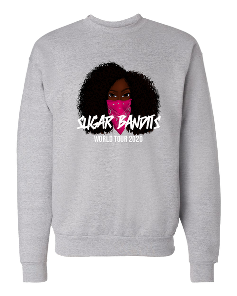 A heather gray crewneck sweater that has the The Sugar Bandits bandit in the center of it. She has a pink bandana covering the bottom half of her face. The The Sugar Bandits logo is written in white horizontally across the bandana and World Tour 2020 is written in white below that.