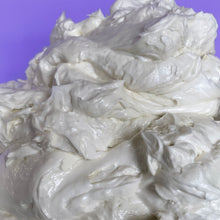 Load image into Gallery viewer, A close up of silky smooth whipped body butter that looks like whipped butter cream icing on a lilac background. 
